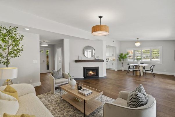 Chandelier, Dining room, Fireplace, Interior, Living room, Pendant Lights, Recessed Lighting, Wood Texture Flooring