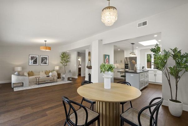 Chandelier, Dining room, Interior, Kitchen, Living room, Pendant Lights, Recessed Lighting, Stainless Steel Appliances, Wood Texture Flooring