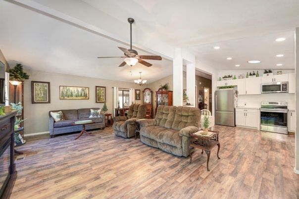Chandelier, Interior, Kitchen, Living room, Recessed Lighting, Stainless Steel Appliances, Wood Texture Flooring