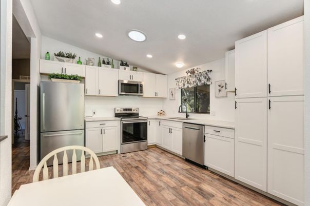 Interior, Kitchen, Recessed Lighting, Stainless Steel Appliances, Wood Texture Flooring