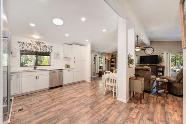 Dining room, Interior, Kitchen, Recessed Lighting, Stainless Steel Appliances, Wood Texture Flooring