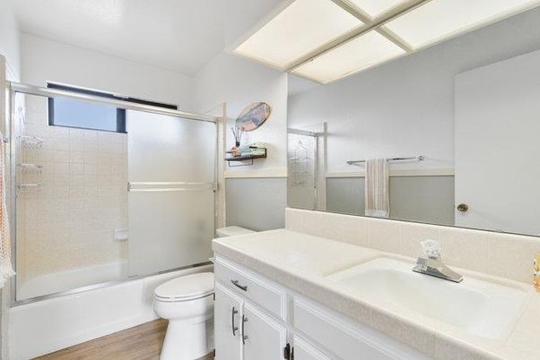 Bathroom, Glass Shower, Interior, Tile Countertops, Wood Texture Flooring