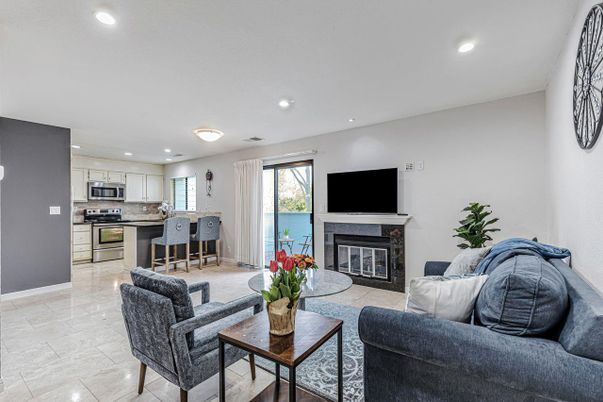 Fireplace, Interior, Kitchen, Living room, Recessed Lighting, Stainless Steel Appliances