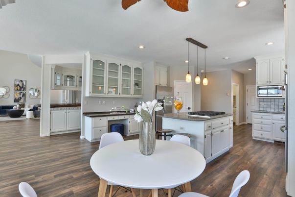 Dining room, Interior, Kitchen, Pendant Lights, Recessed Lighting, Stainless Steel Appliances, Wood Texture Flooring