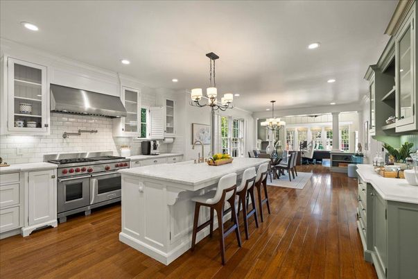 Chandelier, Dining room, Interior, Kitchen, Living room, Pendant Lights, Recessed Lighting, Stainless Steel Appliances, Wood Texture Flooring