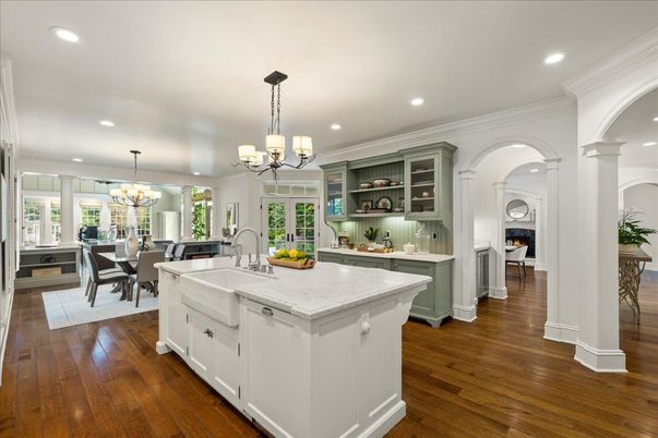 Chandelier, Dining room, Fireplace, Interior, Kitchen, Recessed Lighting, Wood Texture Flooring