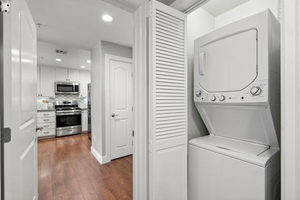 Interior, Kitchen, Recessed Lighting, Stainless Steel Appliances, Utility Closets, Washer, Wood Texture Flooring