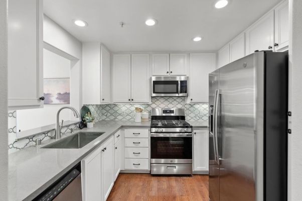 Interior, Kitchen, Recessed Lighting, Stainless Steel Appliances, Wood Texture Flooring