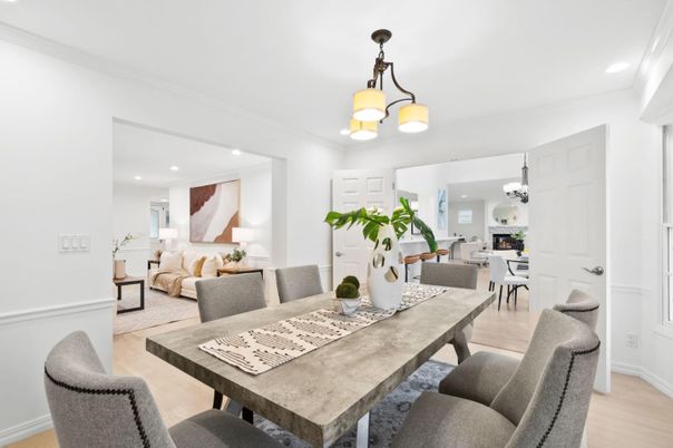 Chandelier, Dining room, Fireplace, Interior, Living room, Pendant Lights, Recessed Lighting, Wood Texture Flooring