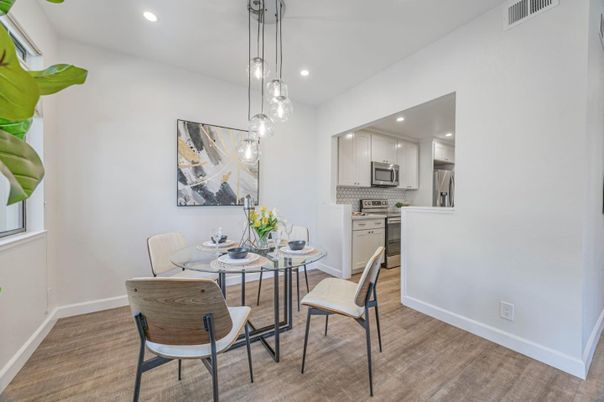 Dining room, Interior, Kitchen, Pendant Lights, Recessed Lighting, Stainless Steel Appliances, Wood Texture Flooring