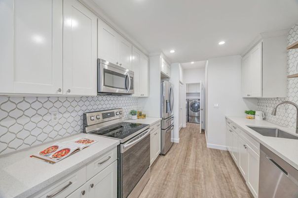 Interior, Kitchen, Recessed Lighting, Stainless Steel Appliances, Washer, Wood Texture Flooring