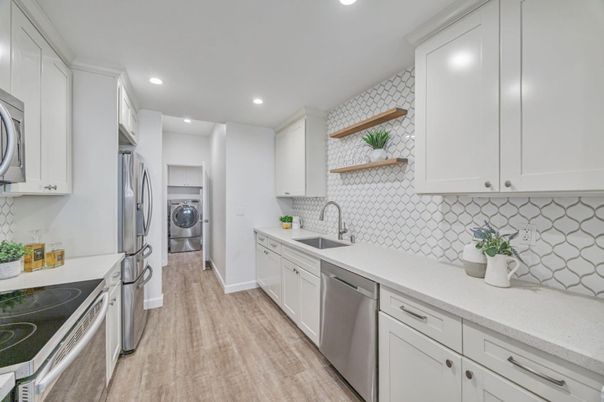 Interior, Kitchen, Recessed Lighting, Stainless Steel Appliances, Washer, Wood Texture Flooring