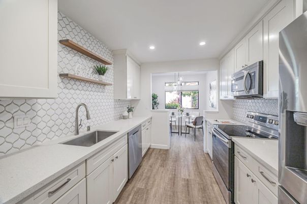 Dining room, Interior, Kitchen, Pendant Lights, Recessed Lighting, Stainless Steel Appliances, Wood Texture Flooring