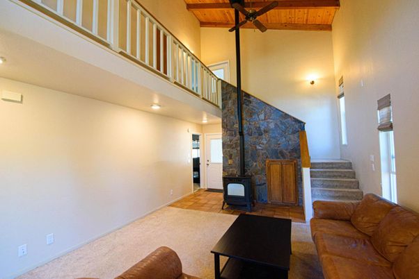 Fireplace, Interior, Living room, Recessed Lighting, Stone Walls, Wooden Beams, Wooden Ceilings
