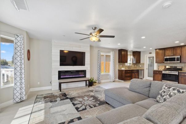 Fireplace, Interior, Kitchen, Living room, Recessed Lighting, Stainless Steel Appliances