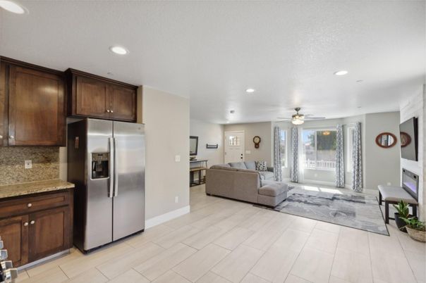 Fireplace, Interior, Kitchen, Living room, Recessed Lighting, Stainless Steel Appliances