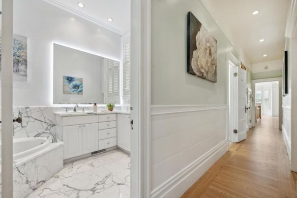 Bathroom, Dual Sink Vanities, Interior, Marble, Recessed Lighting, Wood Texture Flooring