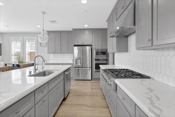 Interior, Kitchen, Pendant Lights, Recessed Lighting, Stainless Steel Appliances, Wood Texture Flooring