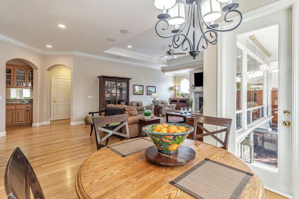 Chandelier, Dining room, Fireplace, Interior, Living room, Recessed Lighting, Wood Texture Flooring
