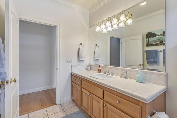 Bathroom, Dual Sink Vanities, Interior, Recessed Lighting, Tile Countertops, Wood Texture Flooring