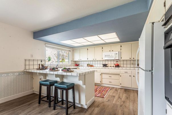 Interior, Kitchen, Tile Countertops, Wood Texture Flooring