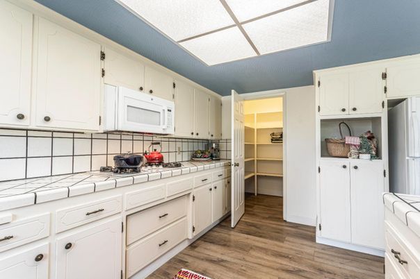 Interior, Kitchen, Tile Countertops, Wood Texture Flooring