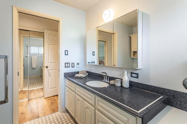 Bathroom, Dual Sink Vanities, Glass Shower, Interior, Wood Texture Flooring
