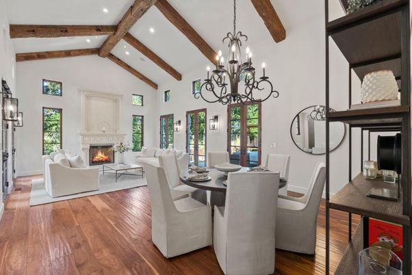 Chandelier, Dining room, Fireplace, Interior, Living room, Recessed Lighting, Wooden Beams, Wood Texture Flooring