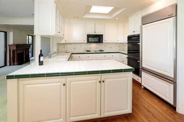 Interior, Kitchen, Recessed Lighting, Tile Countertops, Wood Texture Flooring