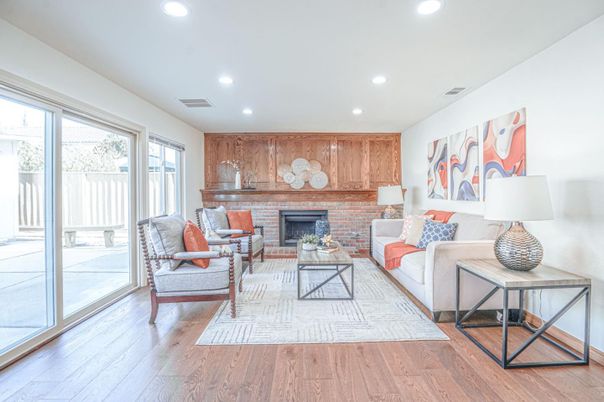Fireplace, Interior, Living room, Recessed Lighting, Stone Walls, Wood Texture Flooring