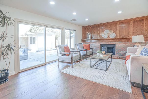 Fireplace, Interior, Living room, Recessed Lighting, Stone Walls, Wood Texture Flooring