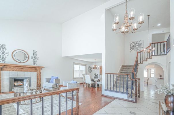 Chandelier, Dining room, Fireplace, Interior, Living room, Recessed Lighting, Wood Texture Flooring