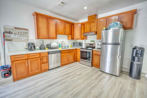 Interior, Kitchen, Recessed Lighting, Stainless Steel Appliances, Wood Texture Flooring
