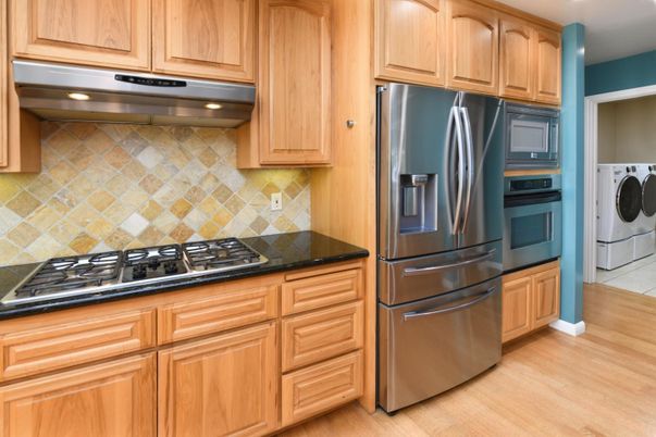 Interior, Kitchen, Recessed Lighting, Washer, Wood Texture Flooring