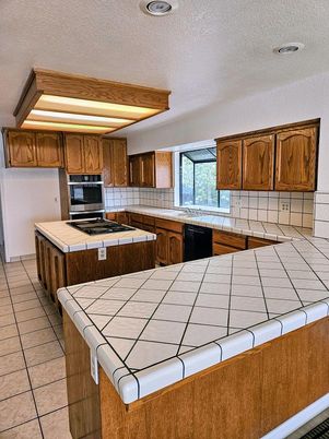 Interior, Kitchen, Recessed Lighting, Tile Countertops