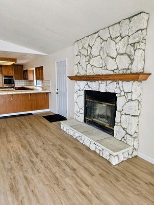 Fireplace, Interior, Kitchen, Stone Walls, Wood Texture Flooring