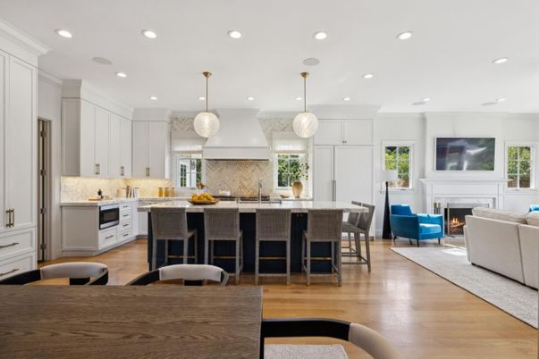 Fireplace, Interior, Kitchen, Living room, Pendant Lights, Recessed Lighting, Stainless Steel Appliances, Wood Texture Flooring