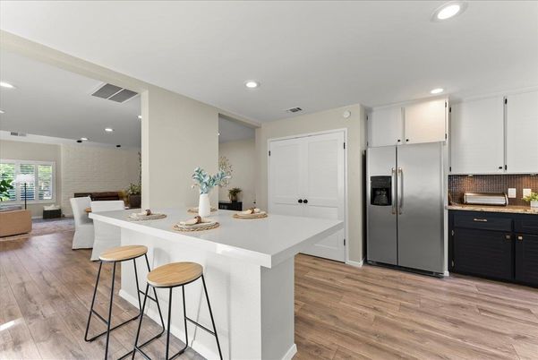 Dining room, Interior, Kitchen, Recessed Lighting, Stainless Steel Appliances, Wood Texture Flooring