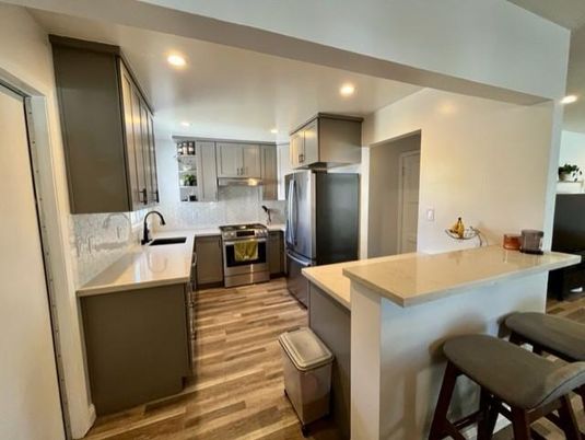 Interior, Kitchen, Recessed Lighting, Stainless Steel Appliances, Wood Texture Flooring
