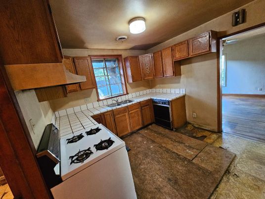 Interior, Kitchen, Tile Countertops, Wood Texture Flooring