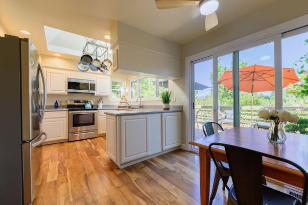 Dining room, Interior, Kitchen, Recessed Lighting, Stainless Steel Appliances, Wood Texture Flooring