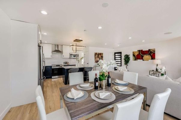 Dining room, Interior, Kitchen, Pendant Lights, Recessed Lighting, Stainless Steel Appliances, Wood Texture Flooring