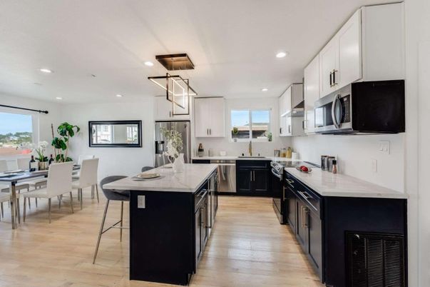 Dining room, Interior, Kitchen, Pendant Lights, Recessed Lighting, Stainless Steel Appliances, Wood Texture Flooring