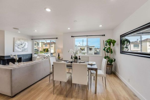 Dining room, Fireplace, Interior, Living room, Recessed Lighting, Wood Texture Flooring