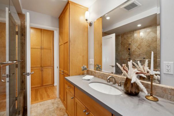 Bathroom, Dual Sink Vanities, Glass Shower, Interior, Recessed Lighting, Wood Texture Flooring