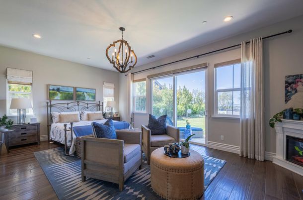 Bedroom, Chandelier, Fireplace, Interior, Recessed Lighting, Wood Texture Flooring