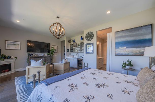 Bedroom, Chandelier, Fireplace, Interior, Recessed Lighting, Wood Texture Flooring