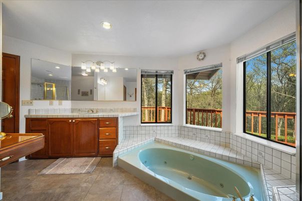 Bathroom, Dual Sink Vanities, Interior, Recessed Lighting, Tile Countertops