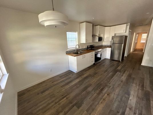 Interior, Kitchen, Pendant Lights, Stainless Steel Appliances, Wood Texture Flooring