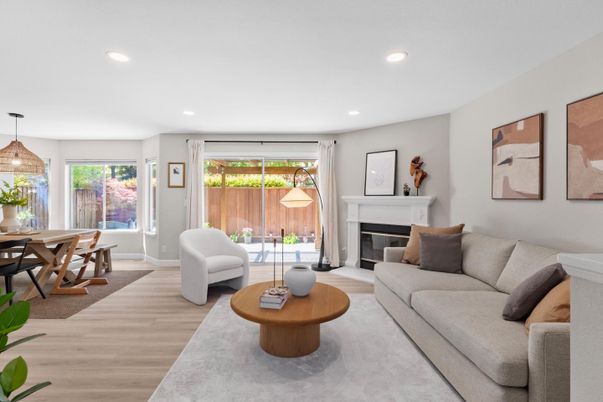 Dining room, Fireplace, Interior, Living room, Pendant Lights, Recessed Lighting, Wood Texture Flooring